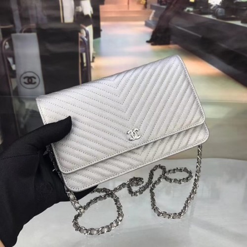 Chanel WOC eredeti kaviár bőr fedeles keresztpántos táska E33814 ezüst