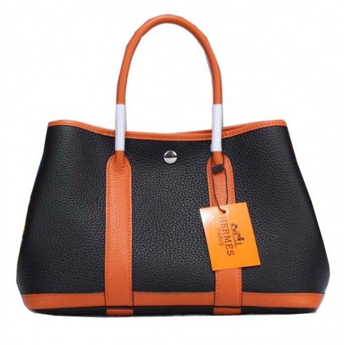 Hermès Garden Party 30 cm-es táska szemcsés bőrből, fekete és narancssárga színben