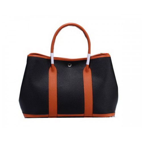 Hermès Garden Party 36 cm-es táska szemcsés bőrből, fekete és narancssárga színben