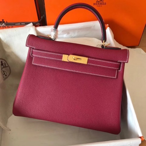 Hermès eredeti Togo bőr Kelly táska KL320 fukszia