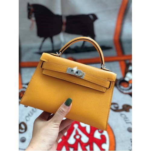 Hermès eredeti mini Kelly Chevre Mysore K19CM Mangó sárga és ezüst fém táska