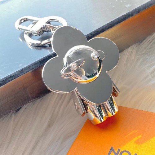 Louis Vuitton CRAFTY VIVIENNE FEJTÁSKA DÍSZÍTŐVEL ÉS KULCSTARTÓVAL M69721